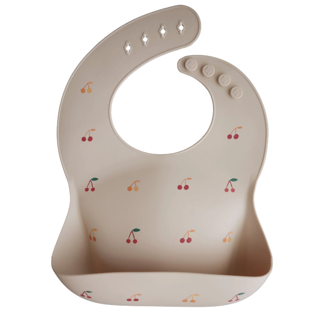 Mushie - Silicone Baby Bib in Cherries
