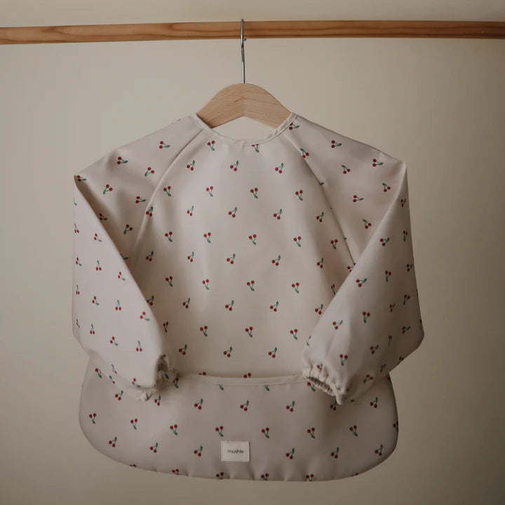 Mushie - Long Sleeve Bib in Cherries