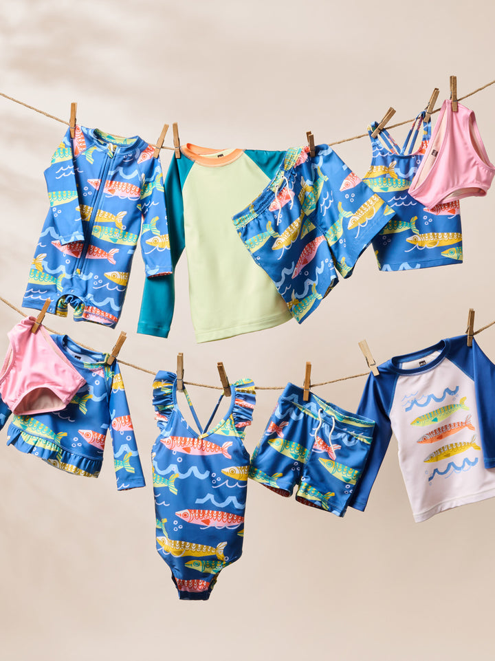 Tea Collection – Rashguard Baby Swimsuit in Sardinas del Mar