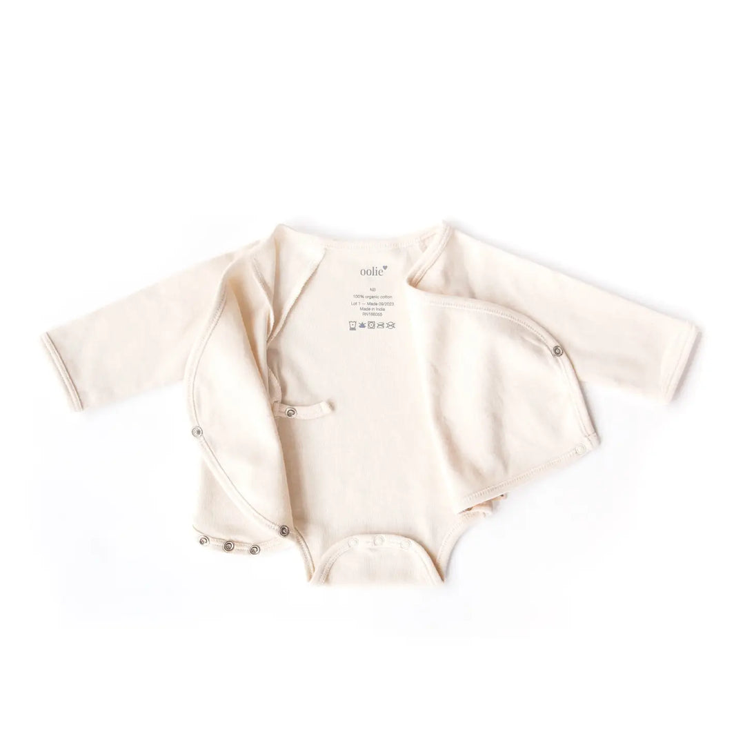 oolie – Organic Baby Wrap Bodysuit in Little Peach