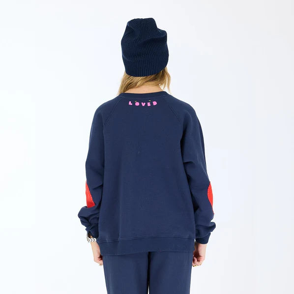 Kerri Rosenthal – Benton Imperfect Heart Patch Sweatshirt in Indigo Blue