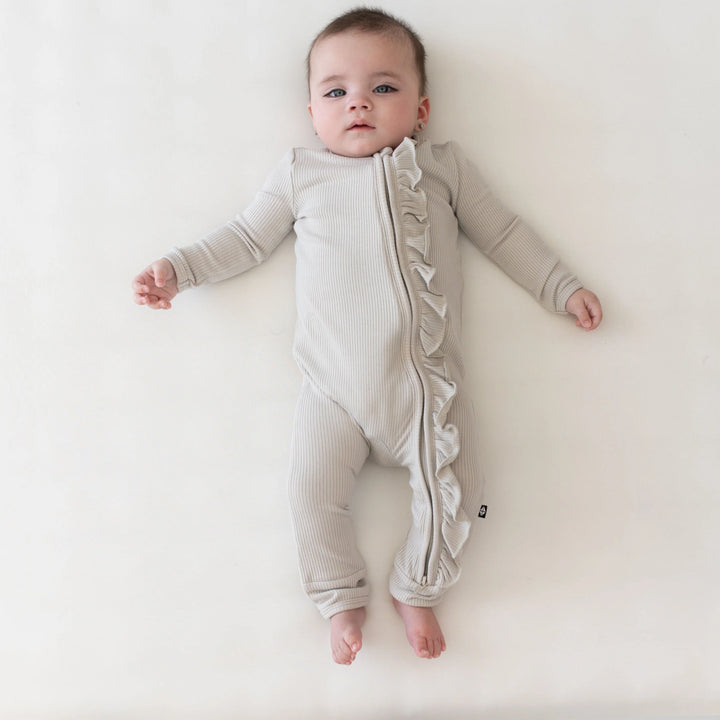 Kyte Baby - Ribbed Ruffle Zipper Romper in Oat