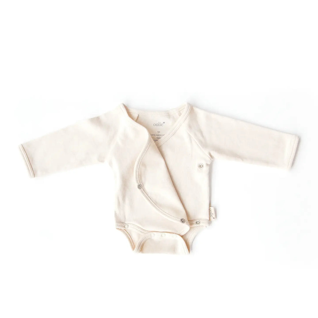 oolie – Organic Baby Wrap Bodysuit in Little Peach