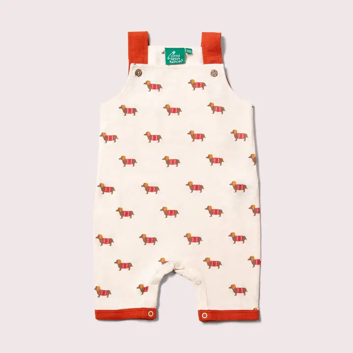 Little Green Radicals –– Sausage Dog Storytime Dungarees in Cream