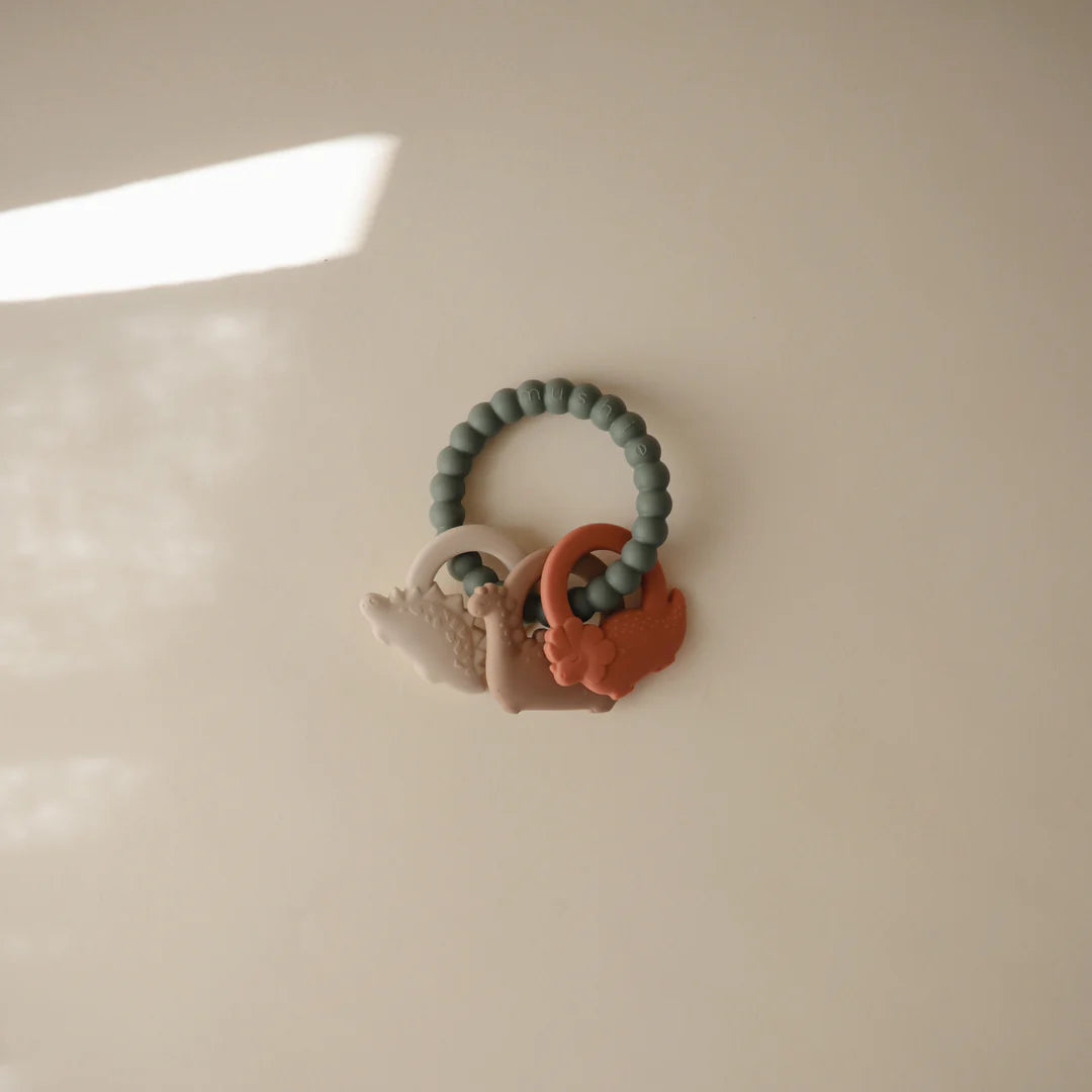 Mushie – Dino Teething Ring