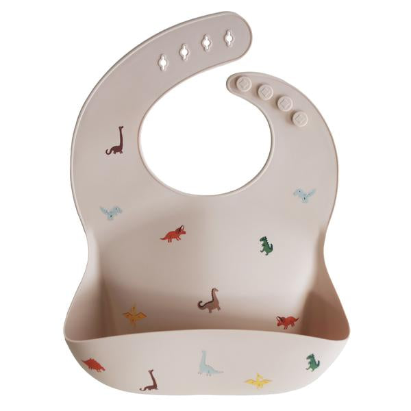Mushie - Silicone Baby Bib in Dinosaurs
